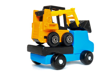 積載車でタイヤショベルを陸送