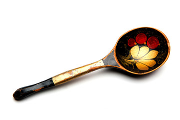 old wooden spoon on white background
