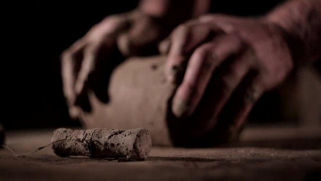 Pottery wheel with clay and cutting string.