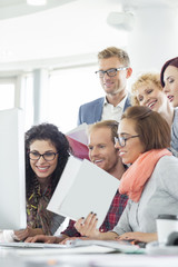 Fototapeta premium Business people using computer in creative office