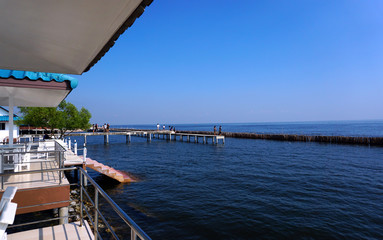 Beach landscape with sea, sky and canopy in a relaxing resort