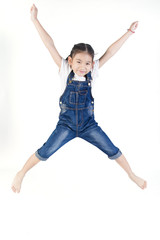 Asian cute child is jumping