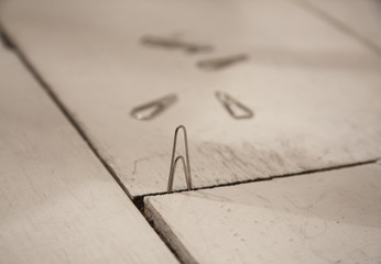 Сlips on the white floor.