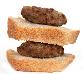 cutlet and bread on a white background