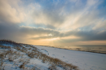 The rays of the sun in snowy beach,rural landscape