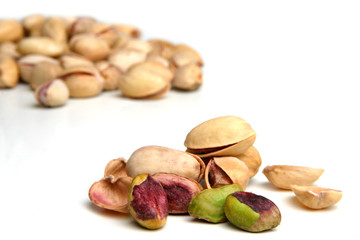 Pistachios on white background - studio shot
