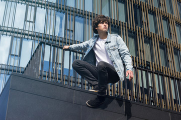 Young man doing parkour in the city