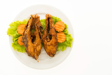 Fried fish in white plate