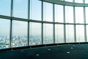 window of building with Tokyo Tower background