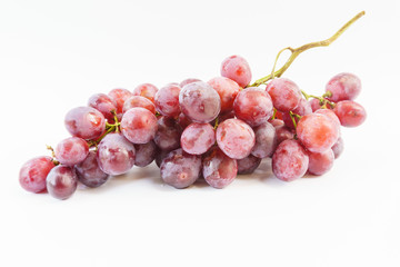 Bunch of red grapes on white background