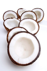 Studio shot of halved coconuts