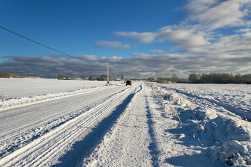 Fototapeta na wymiar Countryside road in a winter.