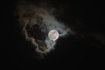 Naklejka na ściany i meble Bright full moon on cloudy scene of night sky