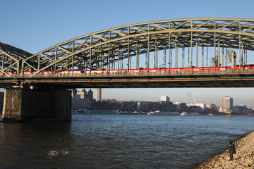 Fototapeta premium View over Cologne in Germany with the famous bridge over the Rhine river 