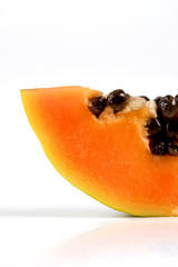 Papaya on white background - close-up