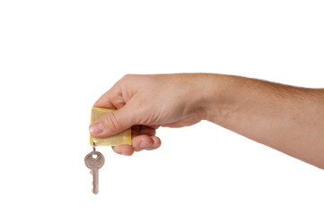 hand with key on white background. isolated on white.