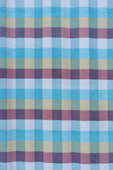 The backdrop made of blue fabric.