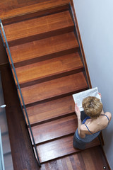 Young woman on stairs