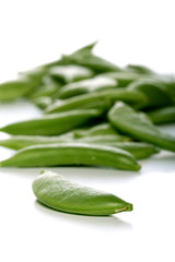 Peas on white background - close-up