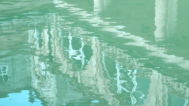 reflections on the water of the Roman Baths complex in somerset city of Bath