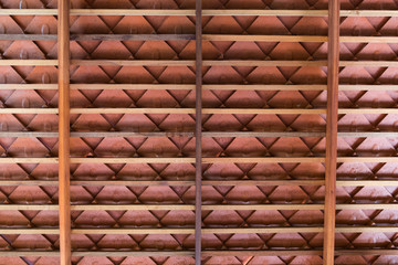 tropical roof with wooden structure and terracotta roof tile