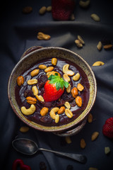 Dessert mystical light chocolate pudding nuts strawberry