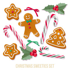 Set of gingerbread Christmas cookies with holly and candy canes.