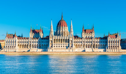 Fototapeta premium Hungarian Parliament and the Danube river in Budapest, Hungary