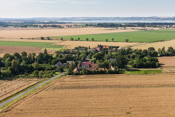 Fototapeta na wymiar aerial view of green harvest fields