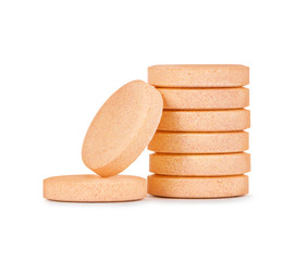 close up of vitamins or pills stack isolated on white background
