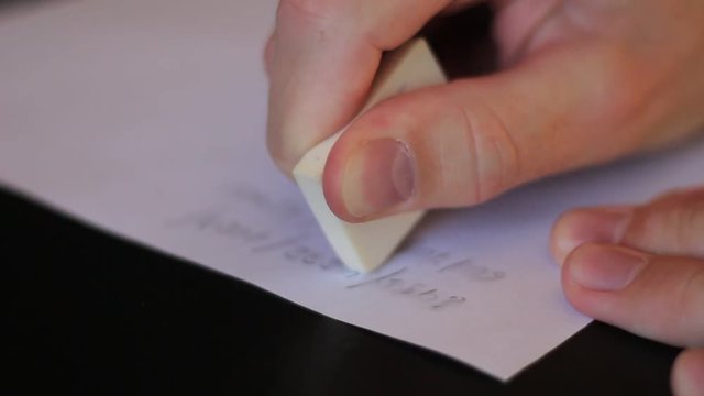 Erasing written from a paper with rubber