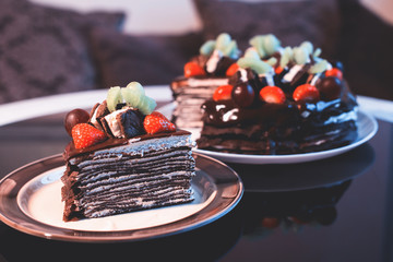 Beautiful chocolate cake with fresh berry,chocolate pie and berries
