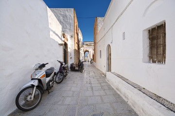 Fototapeta na wymiar Narrow alley and traditional Greek architecture of Lindos, Rhodes Island, Greece
