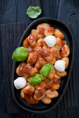 Frying pan with italian gnocchi alla Sorrentina, high angle view
