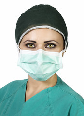 Young nurse in the operating room with green eyes