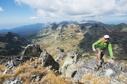 Hiker on trail, Pirin National Park, near Bansko, Bulgaria