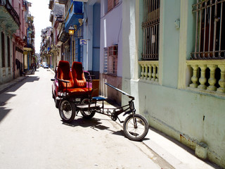 Tricycle at street of Havana