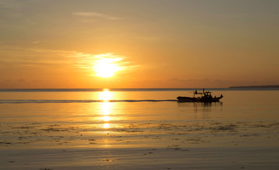 Fototapeta na wymiar Beautiful orange sunset by seaside travel photo.
