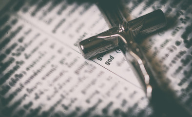Vintage tone of word " God " with cross