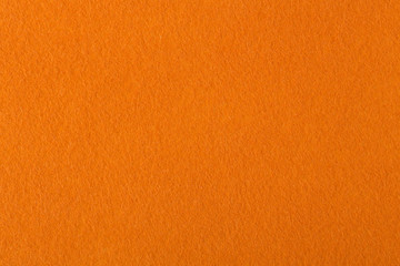 Texture of orange  felt.