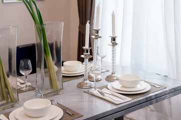 Ceramic tableware on the marble worktop