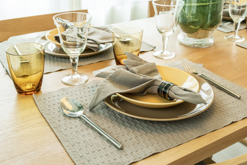 empty plate with service ware on wooden table