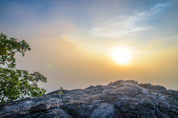 A view from the mountain top with sunrise