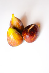 Fototapeta premium Close up view of figs on white table background