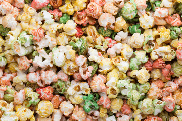 Colored Popcorn texture background. Sweet popcorn.