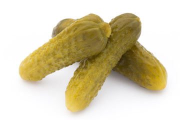 Marinated pickled cucumbers isolated on the white.