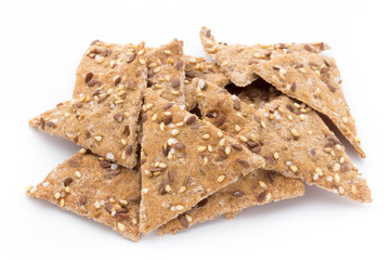 Toasted pita bread chips with herbal seasoning.