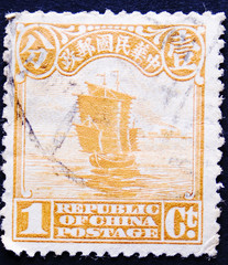 Old Chinese postage stamp with ship