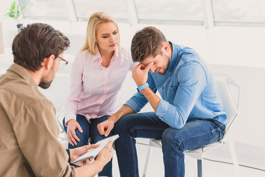 Dramatic couple in office of psychologist