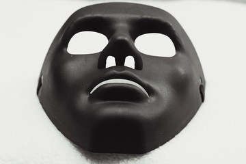 Black mask for Halloween day on white background